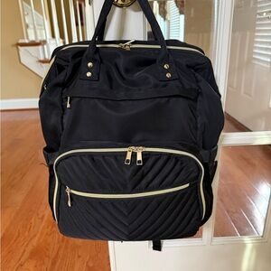 Black Quilted Backpack with Gold Accents